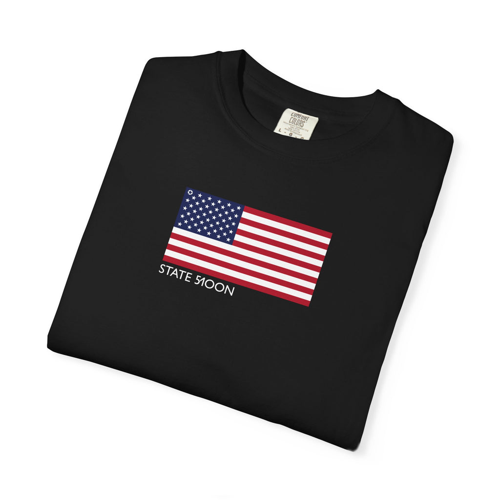 Black Course America tee, folded, close view of the updated American flag and the STATE 51OON wordmark on the chest