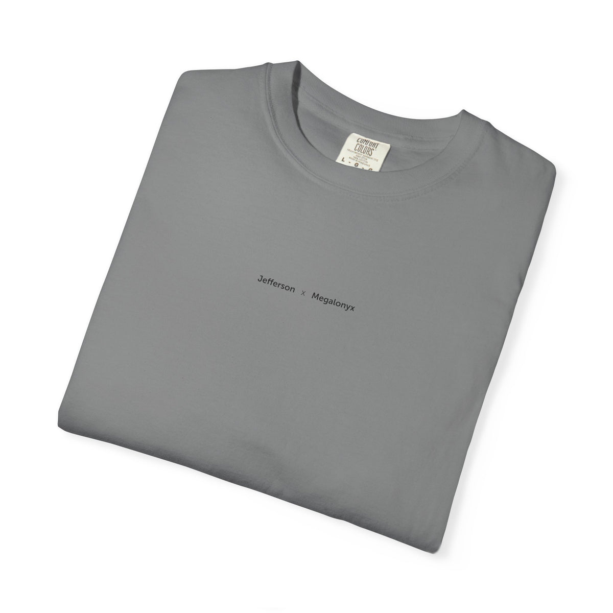 Grey Course America tee, folded, showing the small Jefferson x Megalonyx chest lettering