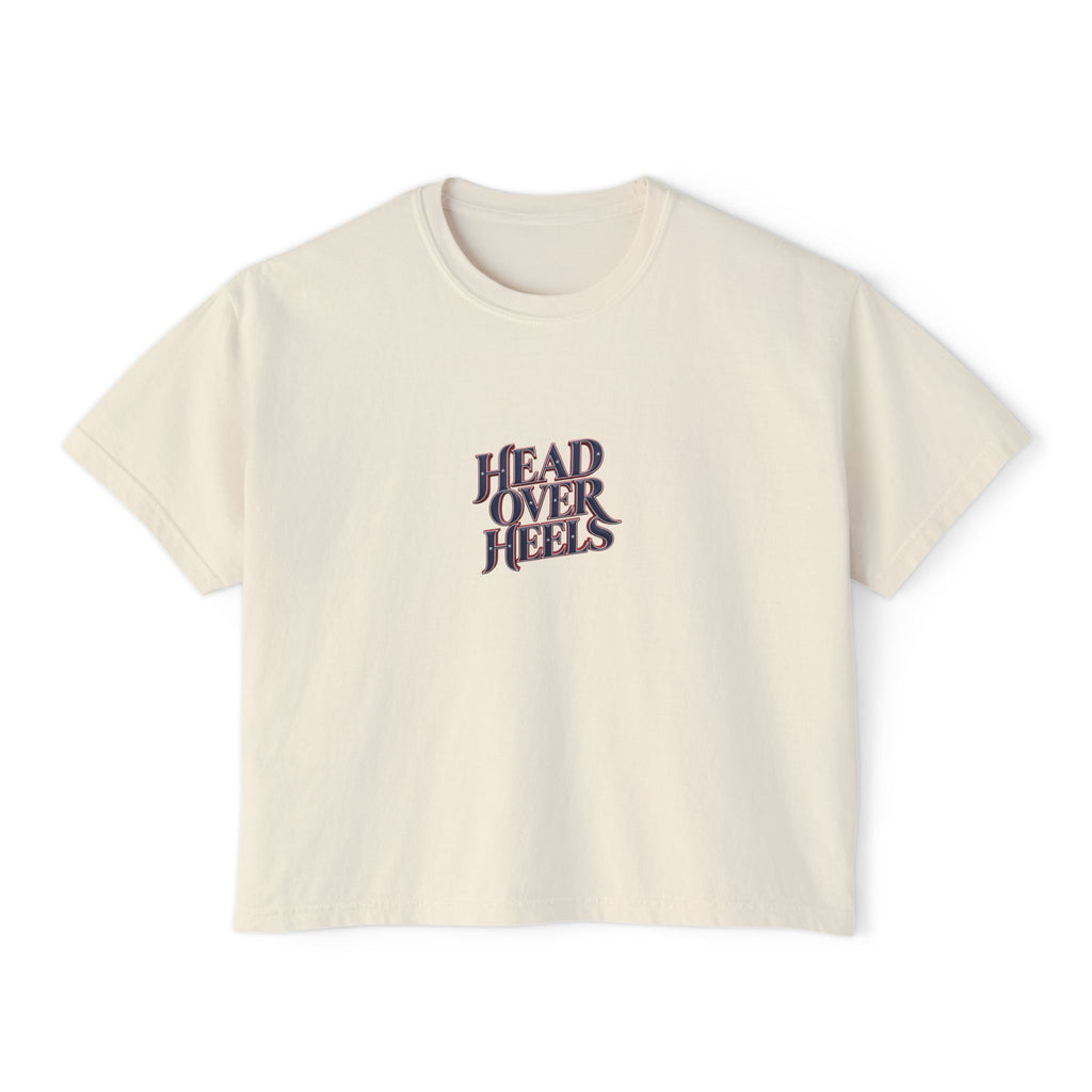 Ivory Course America boxy tee, flat front view, with HEAD OVER HEELS lettering