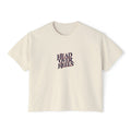Ivory Course America boxy tee, flat front view, with HEAD OVER HEELS lettering