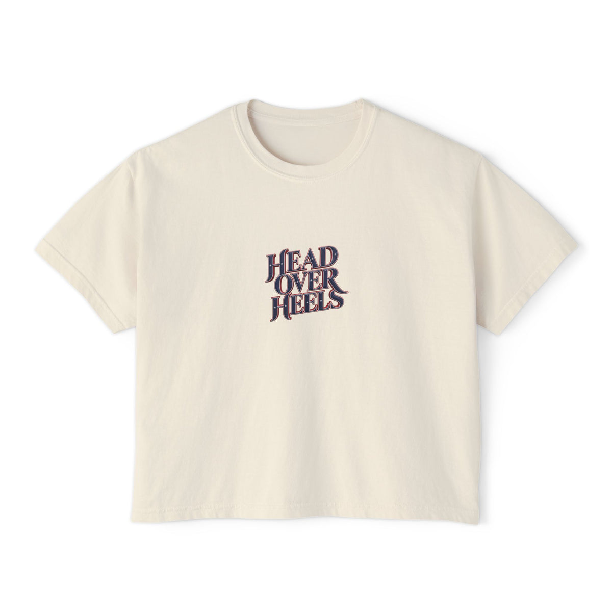 Ivory Course America boxy tee, flat front view, with HEAD OVER HEELS lettering