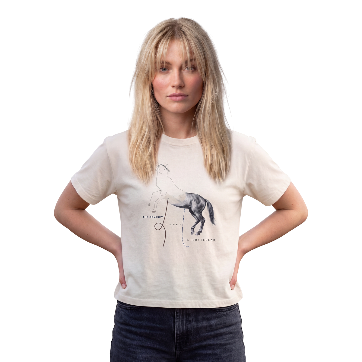 Woman wearing the ivory Course America boxy tee, printed with the Trojan Horse design, half line drawing and half photograph