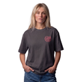 Woman wearing the graphite Course America tee with the pink Central by Nature script on the chest