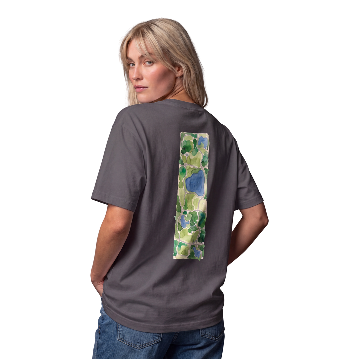 Woman seen from behind in the graphite Course America tee, the back print a watercolour map of Central Park