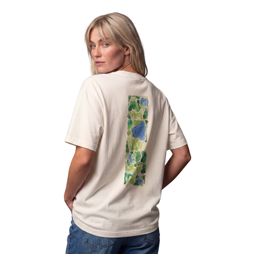 Woman seen from behind in the ivory Course America tee, the back print a watercolour map of Central Park