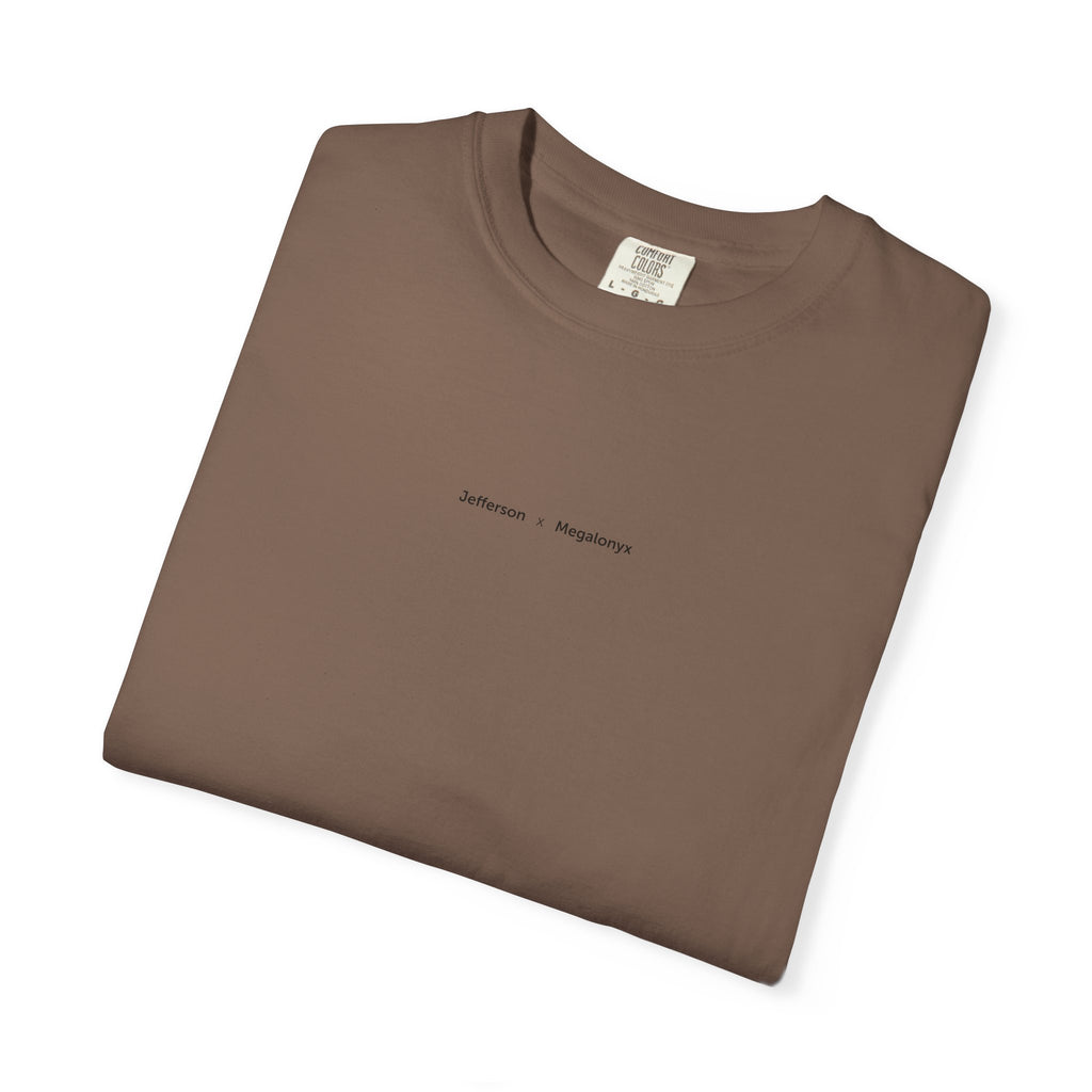 Espresso brown Course America tee, folded, showing the small Jefferson x Megalonyx chest lettering